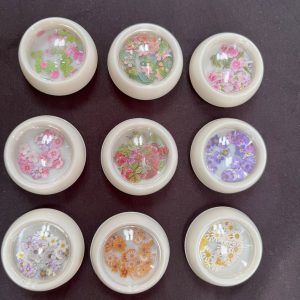 Set de 9 estilos de mini flores para decoración de uñas, llaveros y accesorios 492